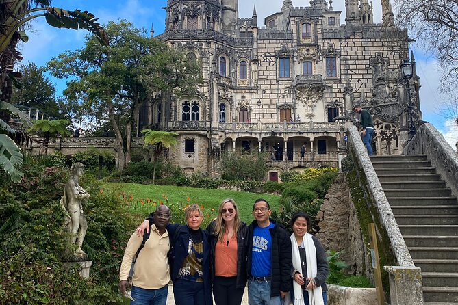 Full Day Tour in Sintra Pena Palace and Quinta de Regaleira - Stop 4: Guincho Beach, wind, sand dunes, and surfers