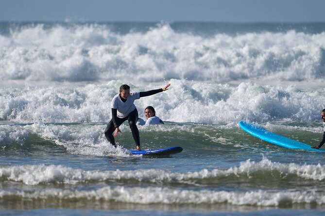 Group Surf Lesson in Costa da Caparica - Gear and Safety Included: Board, Wetsuit, Leash, Insurance