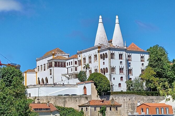 Group to Pena Palace, Sintra (pass by Regaleira) and Cascais - Sintra Village Walk and the Regaleira-Style Monteiro Connection