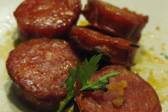 History and Flavors Experience Tour in Lisbon - Praça Luís de Camões at 7 pm, the practical start to a food night