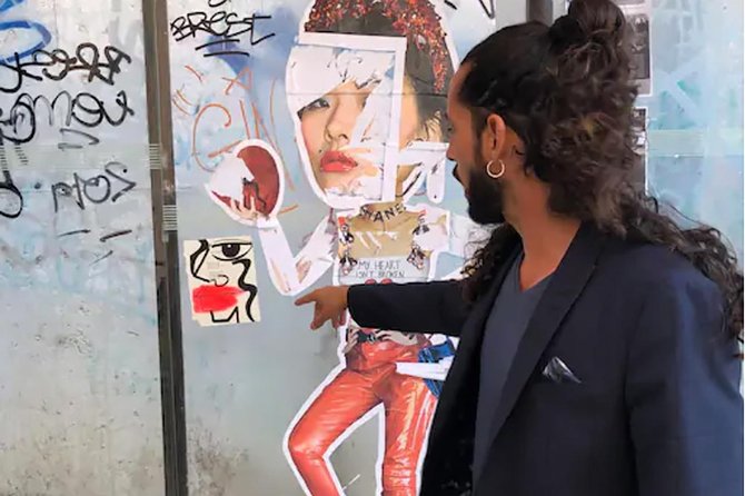 Kickstart Street Art Tour in Lisbon - Stop 1: Shepard Fairey x Vhils (then Add Fuel nearby)