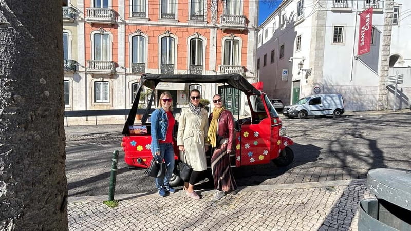 Lisboa: Tuk Tuk ride in Alfama & pick-up you at the hotel. - Private group comfort, languages, and practical pacing