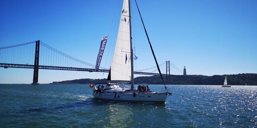 Lisbon: 2-Hour Sailing Yacht Cruise & Guided Tour w/2 drinks - Alfama’s feel and São Jorge’s silhouette, with a modern Lisbon Expo contrast