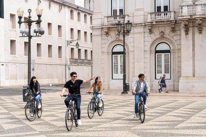 Lisbon 360 City Tour: Bike tour, Boat Trip and Helicopter Flight - Alfama and Praça do Comércio, the city’s oldest layers meet the Tagus edge