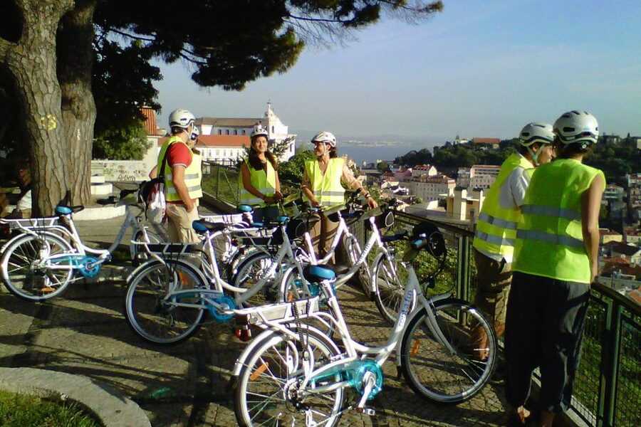 Lisbon: 7 Hills Half-Day Electric Bike Tour - Starting in Alfama, Riding Toward the Harbor: The First 20 Minutes