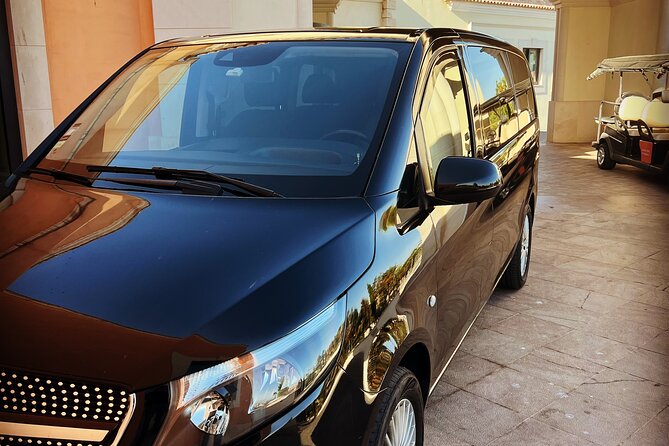 Lisbon Airport Private Transfer - Door to Door Comfort: Air-Conditioned Van, Bottled Water, and Privacy