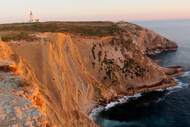 Lisbon: Arrábida Park, Sesimbra, Christ the King private tour - Cabo Espichel: remote cliffs, a working lighthouse, and dinosaur footprints