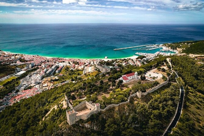 Lisbon: Arrábida & Sesimbra Tour – Wine, Nature & Beaches - Portinho da Arrábida: a breather of clear water and quiet harbor vibes