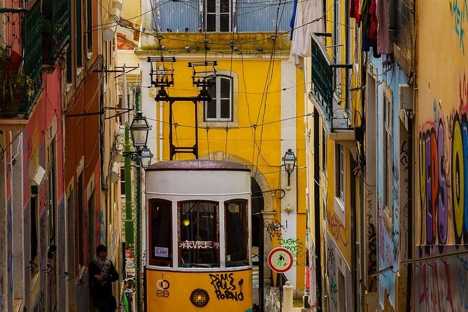 Lisbon & Belém: Private Tour half day trip by Electric Tuk Tuk - Alfama: surviving the 1755 earthquake, plus fado and June festivities