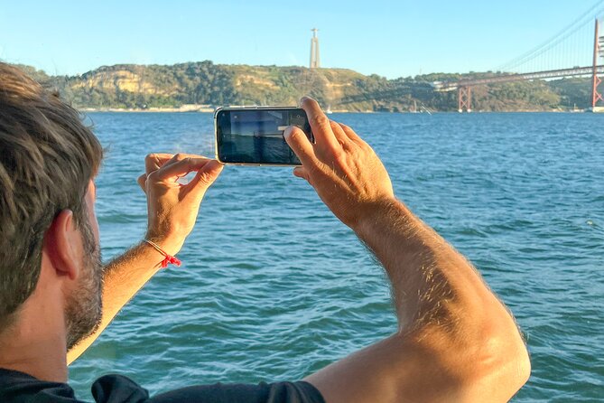 Lisbon Boat ride on Tagus river - MAAT waterfront pass: modern lines, river reflections