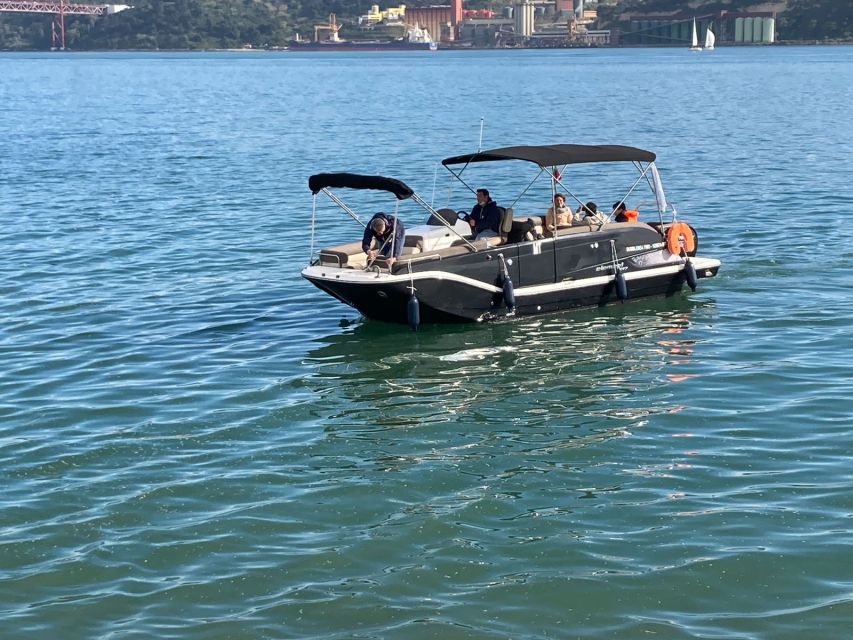 Lisbon: Boat Tour with Champagne - Belém Tower, the Discoveries monument, and Champalimaud area closure