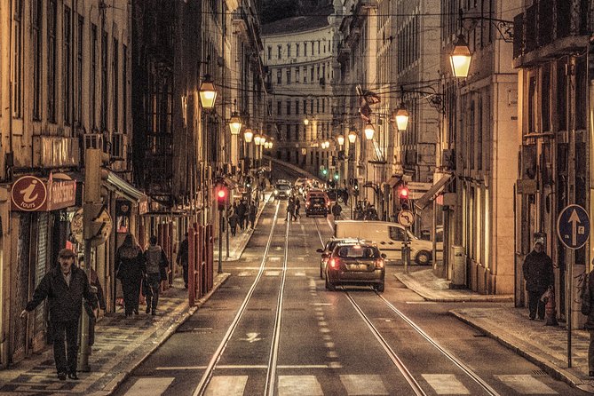 Lisbon by Night: Golden and Blue Hour Photography Walk - Stop 3: Miradouro Das Portas Do Sol for Cobblestones, Tram Tracks, and Headlights
