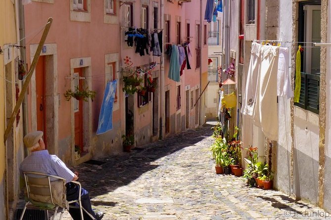 Lisbon by Night Tour: Fado Show and Dinner with Pick-up - Rossio Station, Named Streets, and the Places You Can Find Again