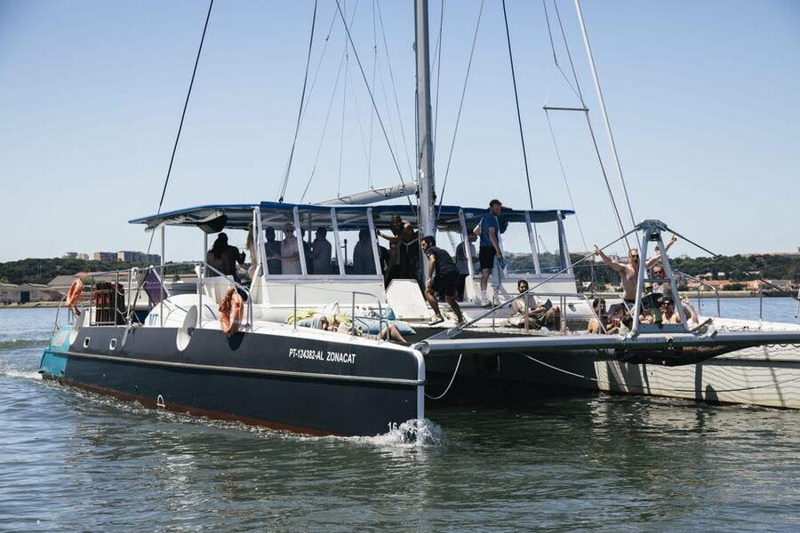 Lisbon: Catamaran Boat Party with Music, Open Bar & Dives - Key things to know before you go
