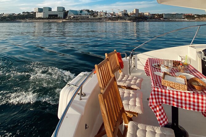 Lisbon: Catamaran Luxury Sunset and Wine Tour - Belém Tower and Jerónimos from the river: the views hit harder
