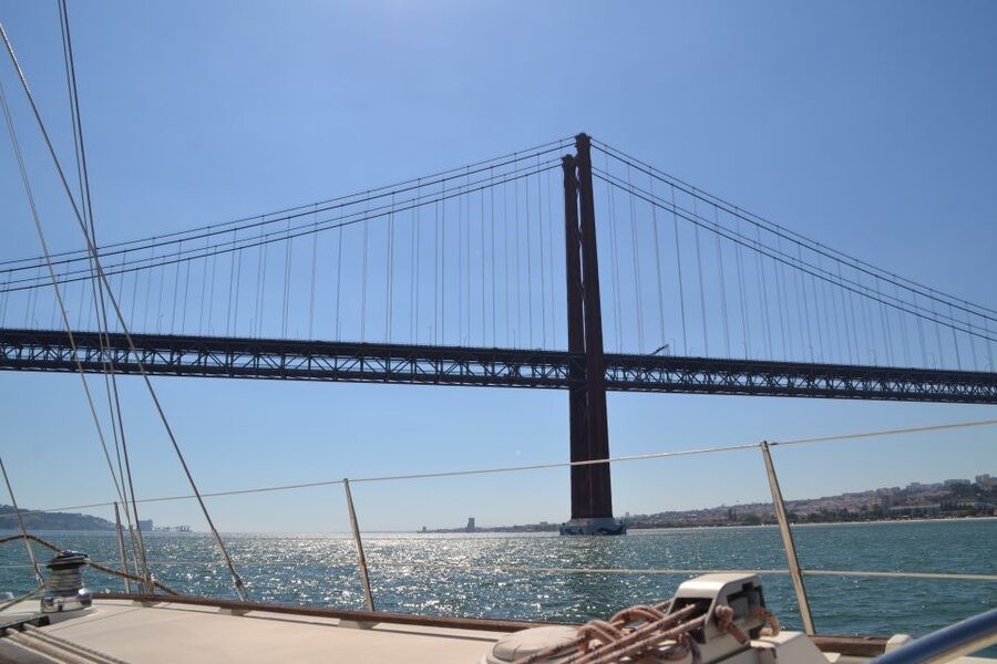 Lisbon: Champagne Sailing Tours - Belém Tower and the Monument to the Discoveries: the historic riverfront, seen at sea level