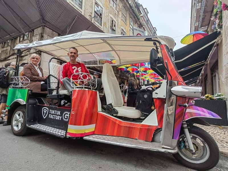 Lisbon: City Highlights Tuk-Tuk Tour with Pickup - Pickup and the downtown warm-up near Rossio and Santa Justa
