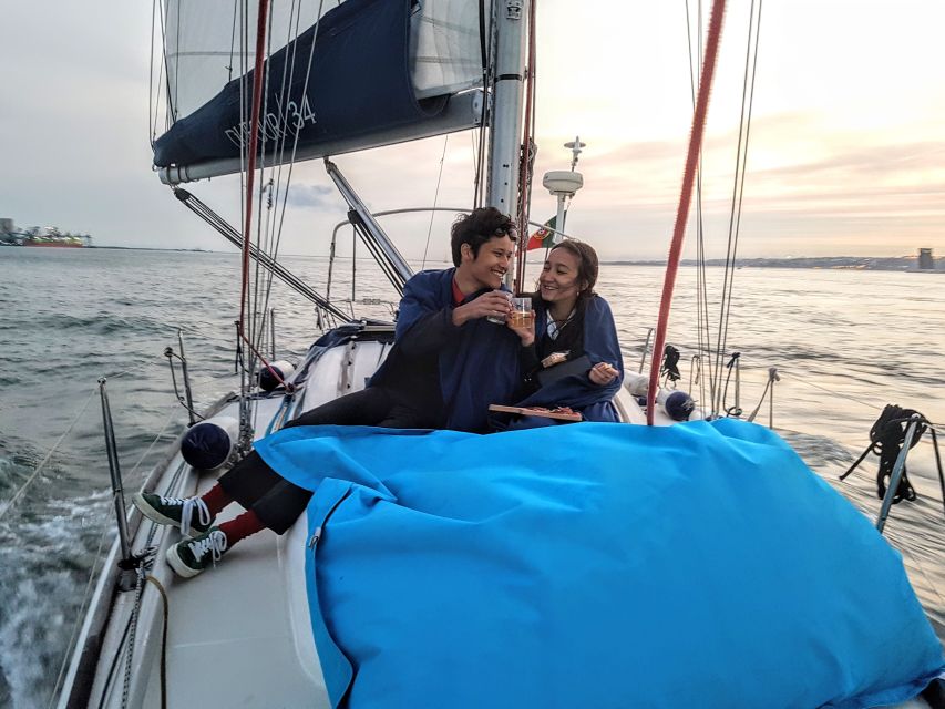 Lisbon: City Skyline Sailboat Cruise with Drink and Snacks - Starting at Santo Amaro, going straight under the 25 de Abril Bridge