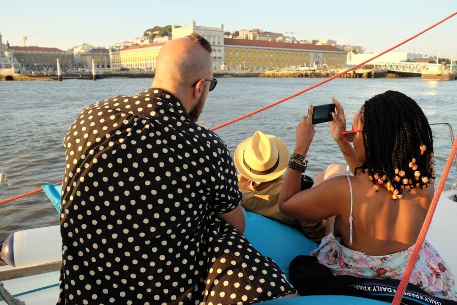 Lisbon: City Skyline Sailboat Cruise with Drink and Snacks - Belém Tower and the Monument to the Discoveries area, seen like a postcard with depth