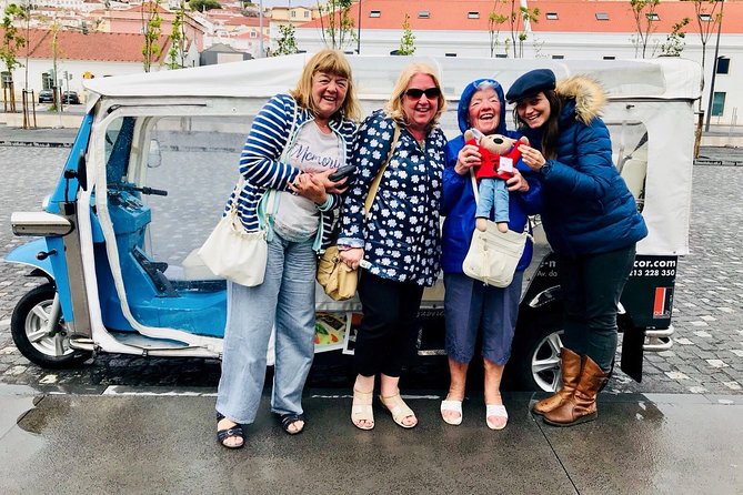 Lisbon: City Tour by Tuk Tuk - Chiado: the center, with stories in the squares