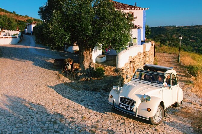 Lisbon Countryside Food Tour on a Vintage Car - Stop 2 in Ericeira: Calçada Portuguesa streets and a sweet taste