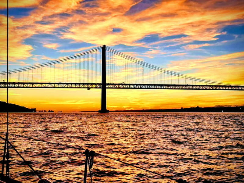 Lisbon: Daytime or Sunset Boat Cruise with History and Wine - Alfama, Commerce Square, and Chiado: From River Glow to City Rhythm
