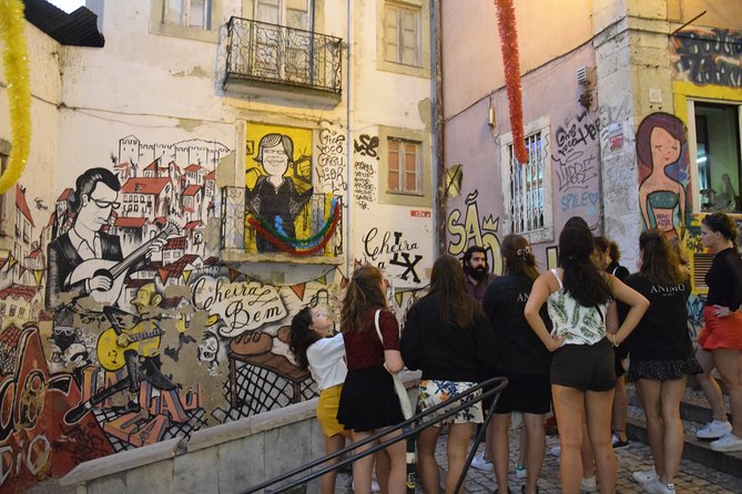 Lisbon Fado Experience: Walking Tour, Dinner and Live Music Show - Meeting near Rossio, then stepping into old streets