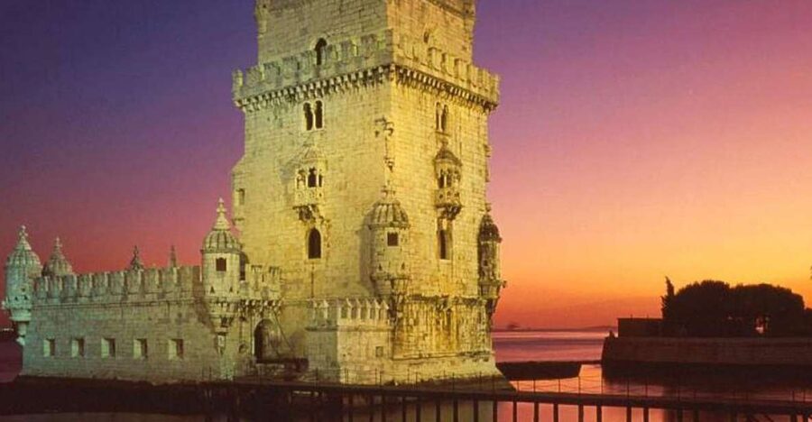 Lisbon: Fado Night Tour - Moving into Belém at night: Discoveries, Jerónimos, and the Tower