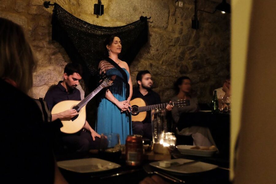 Lisbon: Fado Show and Portuguese Dinner - Inside the traditional Fado house, where dinner and music share the same room