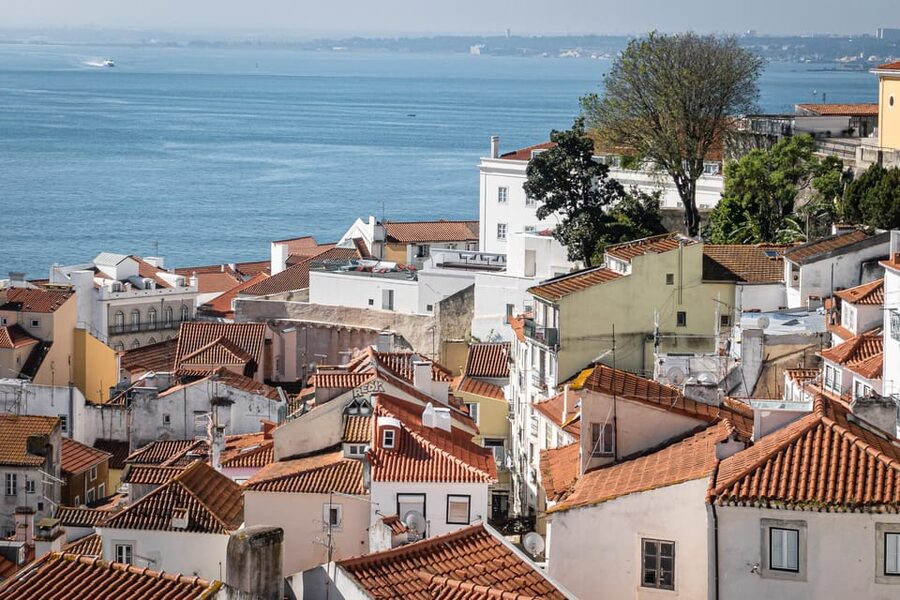 Lisbon: Flexible Walking Tour of Alfama - Descending past Church of São Miguel and closing with Lisbon Cathedral