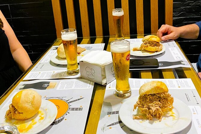Lisbon Food and Wine Tasting Tour of HIDDEN GEMS (Small Groups) - Stop 1 at Praça Luís de Camões: bifana plus beer to kick things off