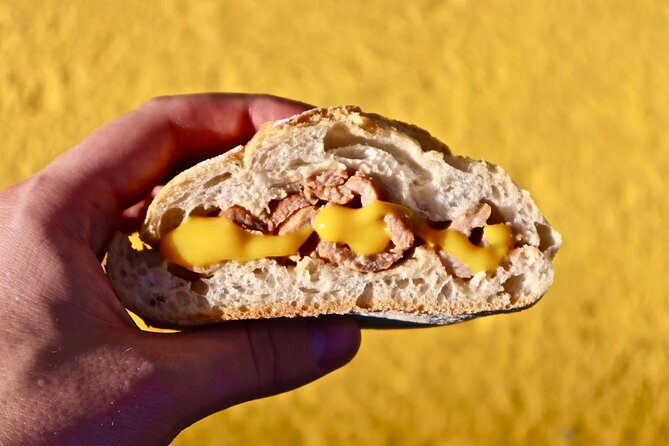 Lisbon Food Tour with 10+ Tastings of Local Delicacies & Wines - Petiscos and bifana: the snacks that keep Lisbon moving
