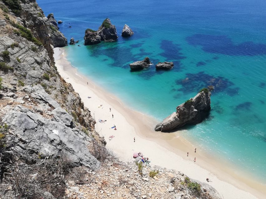 Lisbon: Full-Day Sesimbra Kayak Tour with Picnic - Landing At The Beach: Picnic Lunch, Games, And A Real Snorkel Moment