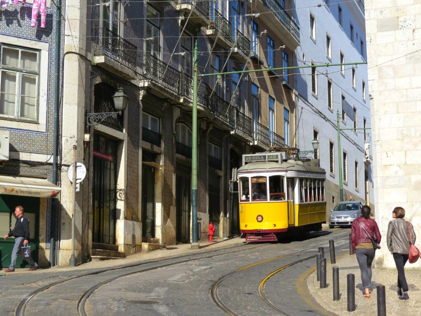 Lisbon: Full-Day Small-Group City Tour with Hotel Pickup - Alfama, Chiado, and Lisbon Cathedral, where the city turns steep and real