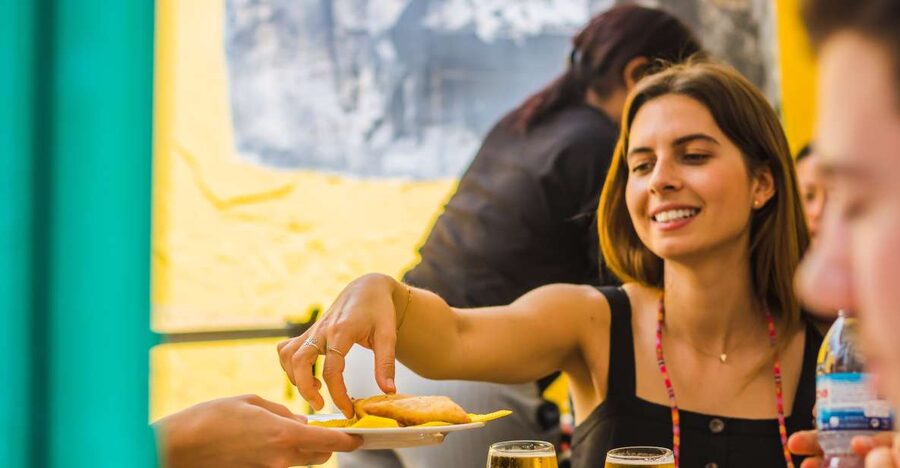 Lisbon: Guided Food and Wine Tasting Tour - Mouraria guided backstreets: street life, street art, and Fado mood