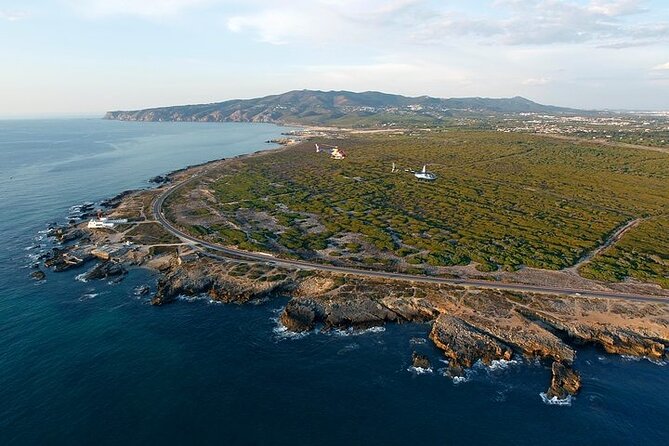 Lisbon: Helicopter Tour over Cascais & Cabo da Roca - Hell’s Mouth cave: Atlantic force on display