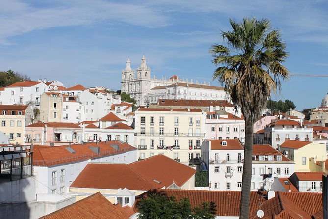 Lisbon in the eye of a Portuguese writer - Baixa Pombalina Walk: Squares, Rossio Area Landmarks, and Two Special Stops