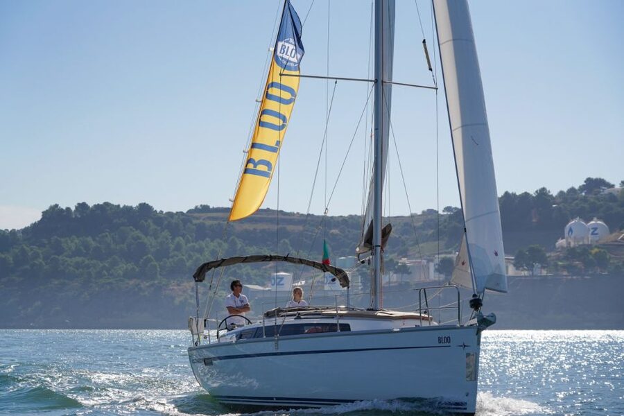Lisbon: Luxury Private Sailing Boat Cruise on River Tagus - Lisbon hills from below: Alfama, Bairro Alto, and Castelo de S. Jorge