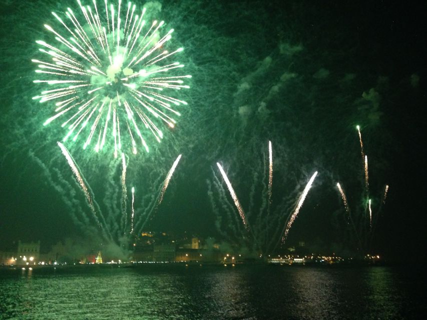 Lisbon: New Year’s Eve Fireworks Tagus River Sailing Cruise - The countdown ritual on the water: wine, raisins, and bolo rei