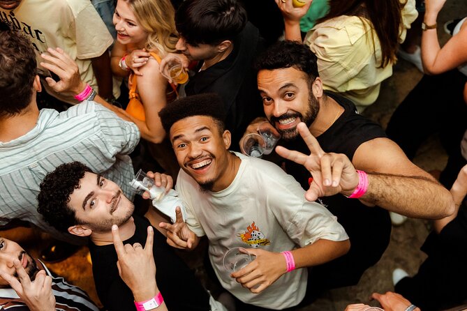 Lisbon Pink Street Pubcrawl: 1h Open Bar, Shots,VIP Club Entry - Stop 1: Praça Luís de Camões, a quick start in the right neighborhood