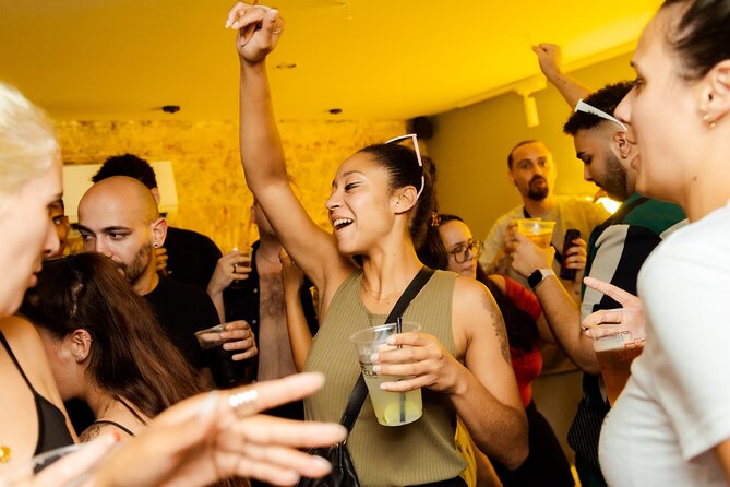 Lisbon Pink Street Pubcrawl: 1h Open Bar, Shots,VIP Club Entry - Stop 2: Bairro Alto for two hours and your first shot