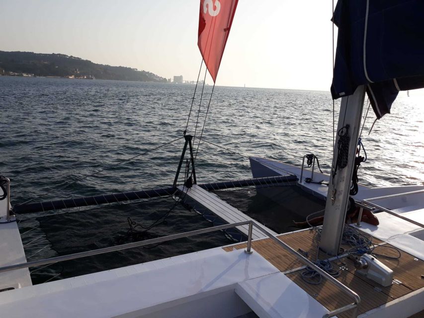 Lisbon: Private Catamaran Charter for up to 18-People - What’s included on board: crew, one drink, crackers, and insurance