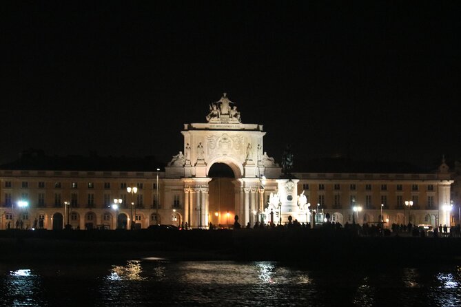 Lisbon Private Luxury Boat Tour with Welcome Drink - Under the 25 de Abril Bridge and toward Terreiro do Paço