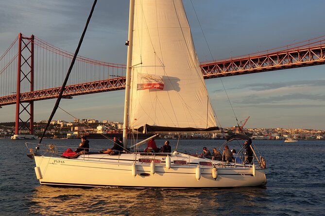 Lisbon Private Sailing Cruise with Locals - Spotting dolphins and handling special moments