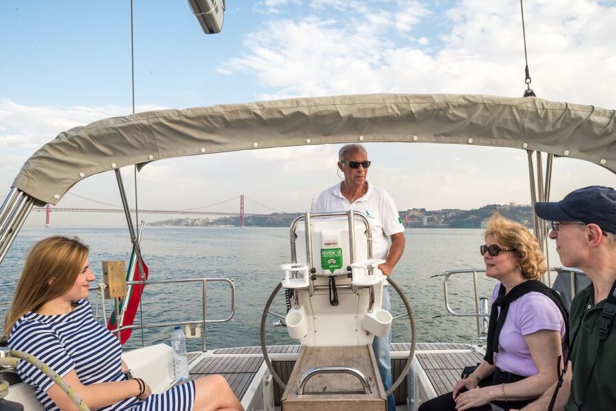 Lisbon: Private Sunset Cruise on the Tagus River with Drink - Almada at last: Cristo-Rei’s outstretched arms for the big sunset moment