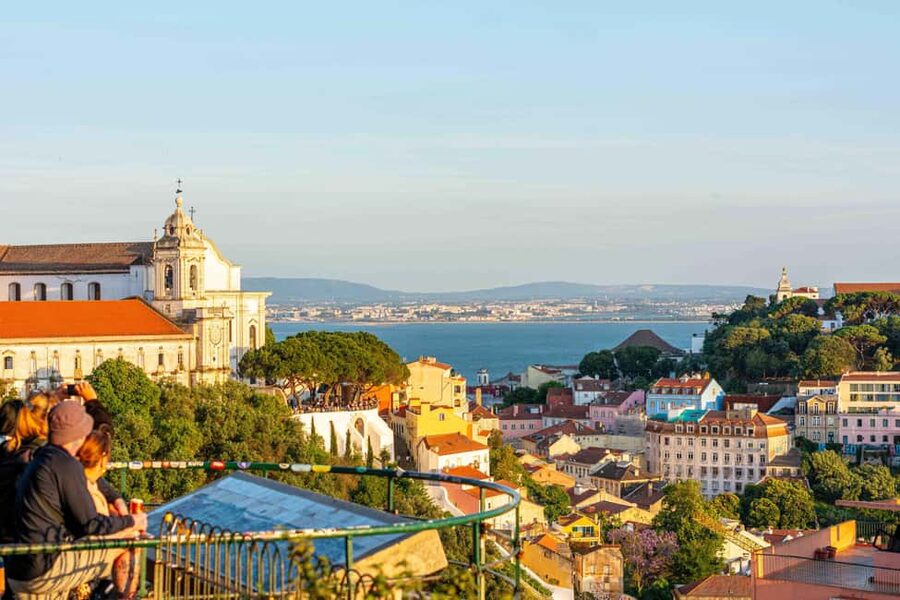 Lisbon: Private Sunset & Night Photo Walk - Private group pacing through Alfama’s lanes