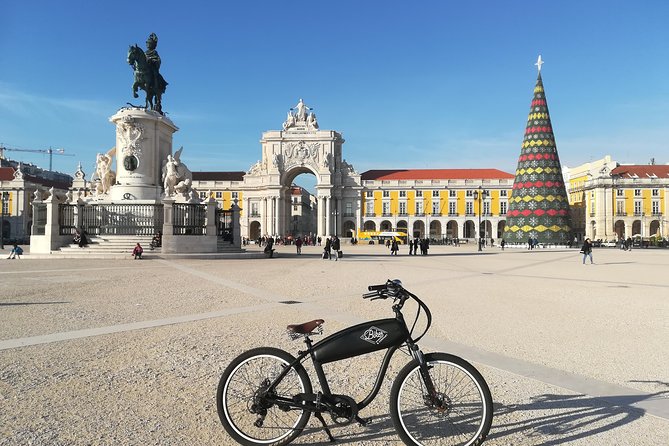 Lisbon Regular or Electric Bike Rental - Rossio pavements, the train station area, and Chiado walking breaks