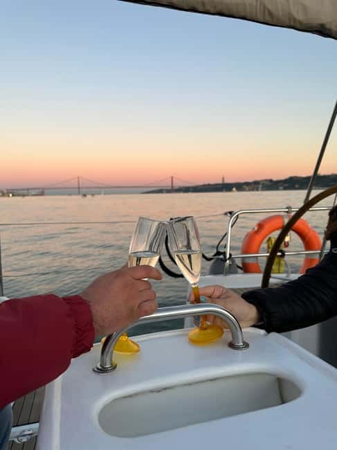 Lisbon: Romantic Cruise with Wine & Portuguese Tapas - Commerce Square and Alfama, where the old city gets real