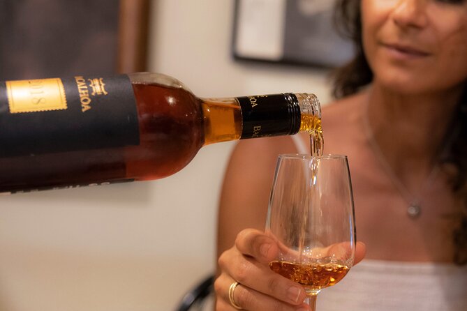 Lisbon's authentic Food and Wine tour with a Winemaker - Stop 3 in Alfama at A Muralha: petiscos, visuals, and a longer tasting session