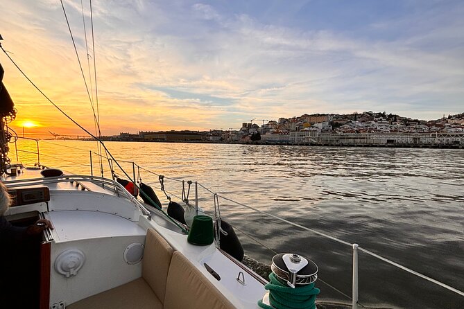Lisbon's Iconic Waterfront by Sail - The stylized boat monument: symbols you can actually read